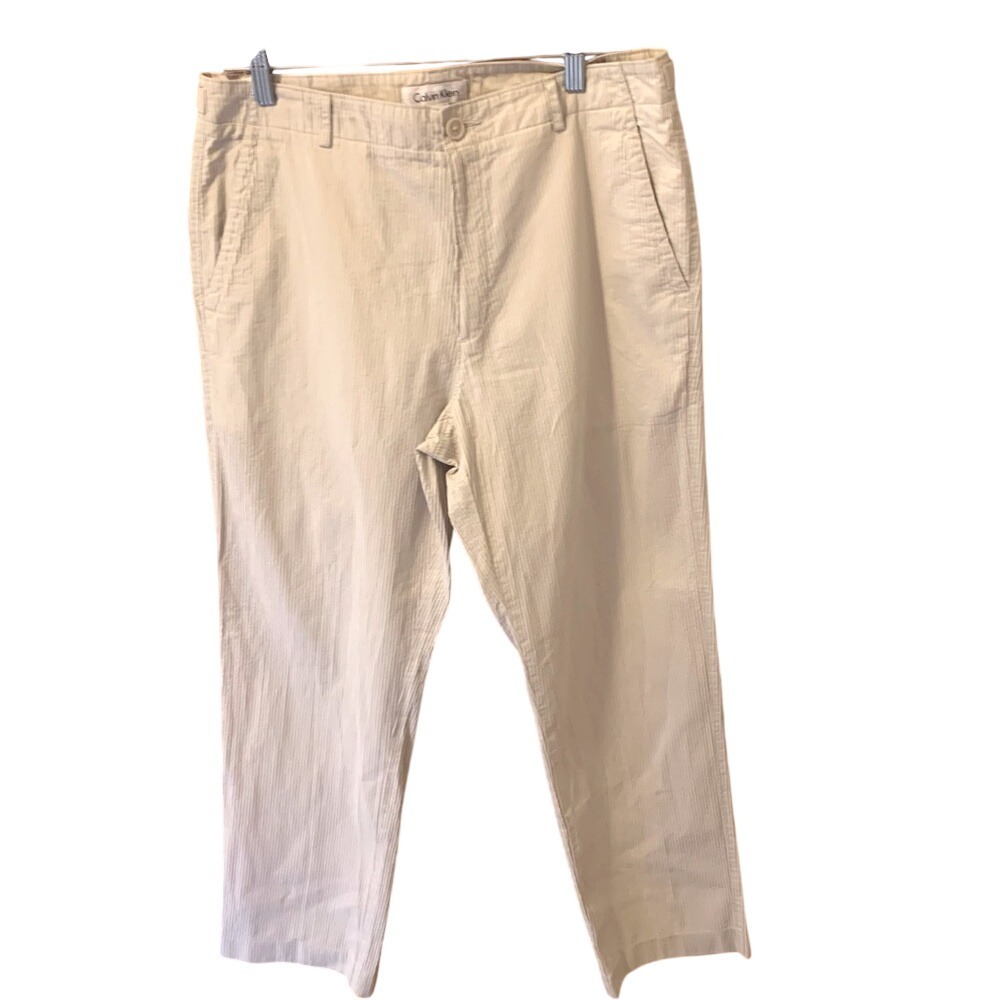 CALVIN KLEIN. Cream Twill Pants,33X30. flat front w/ two pockets.